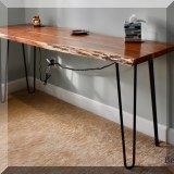 F34. Live edge wooden desk. 30”h x 66'w x 22”d 